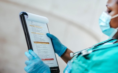 Healthcare professional reviewing records